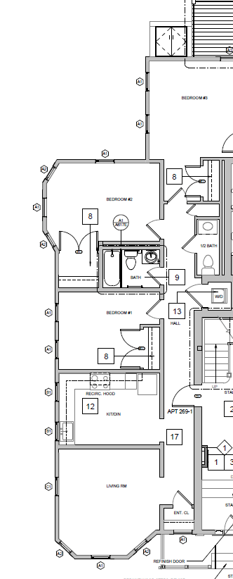 Large living space with kitchen alcove, breakfast bar, and a closet downstairs